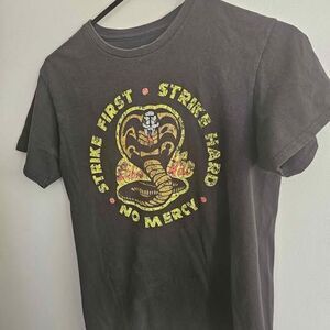 Strike First T-shirt size small